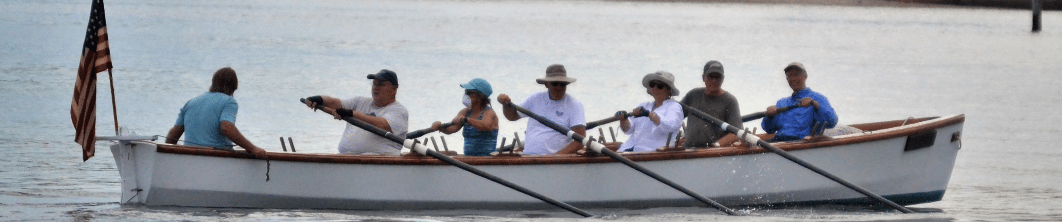 Beaufort Oars members rowing a traditional boat