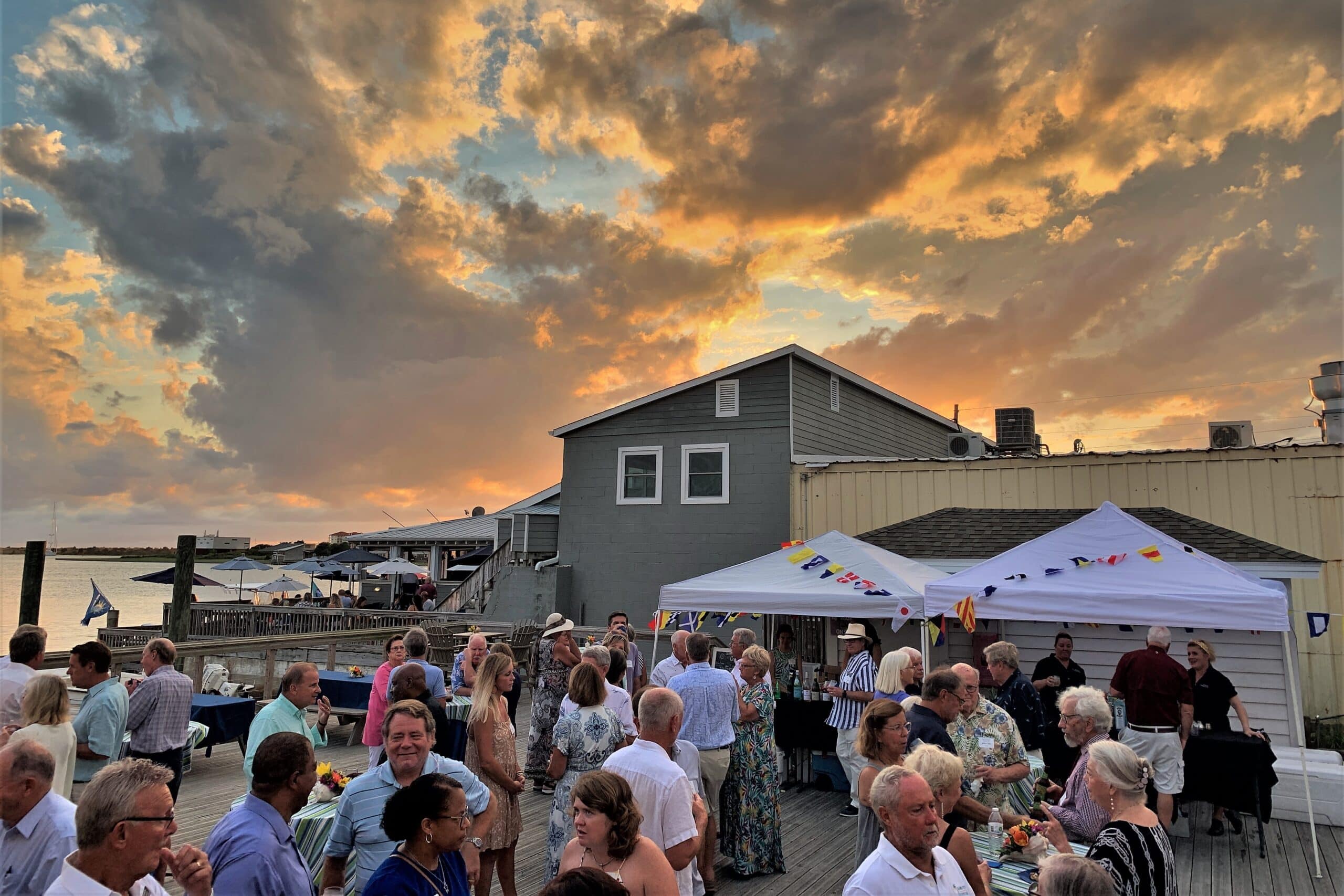 Friends members gathering at a waterfront event